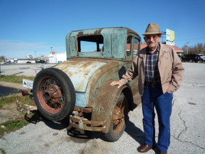 Dad by and old Model A like one he owned as a young man